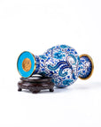 Close-up detail of the gold-plated copper rim and enamel bule and white porcelain peony on this Royal Cloisonne vase,a premium piece for luxury home decor and home gifts