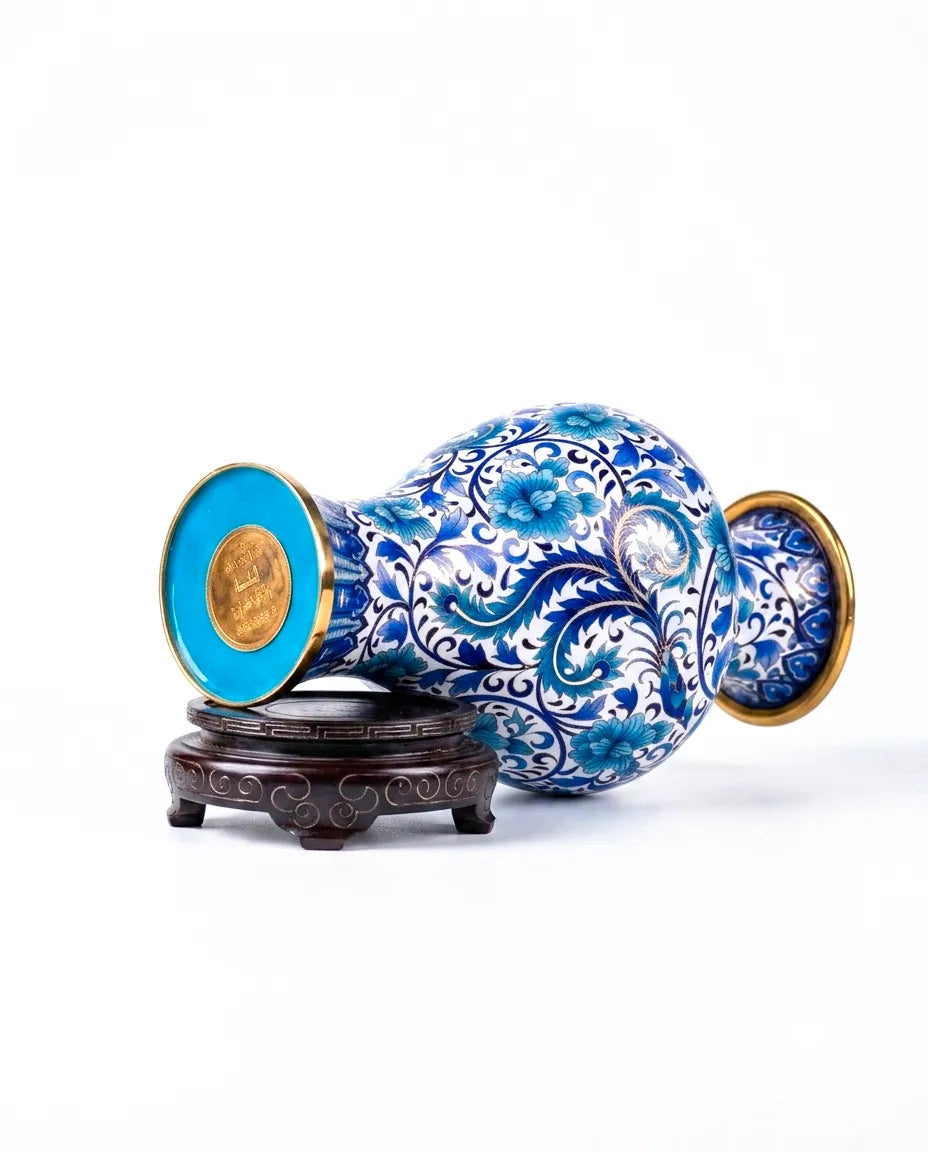 Close-up detail of the gold-plated copper rim and enamel bule and white porcelain peony on this Royal Cloisonne vase,a premium piece for luxury home decor and home gifts