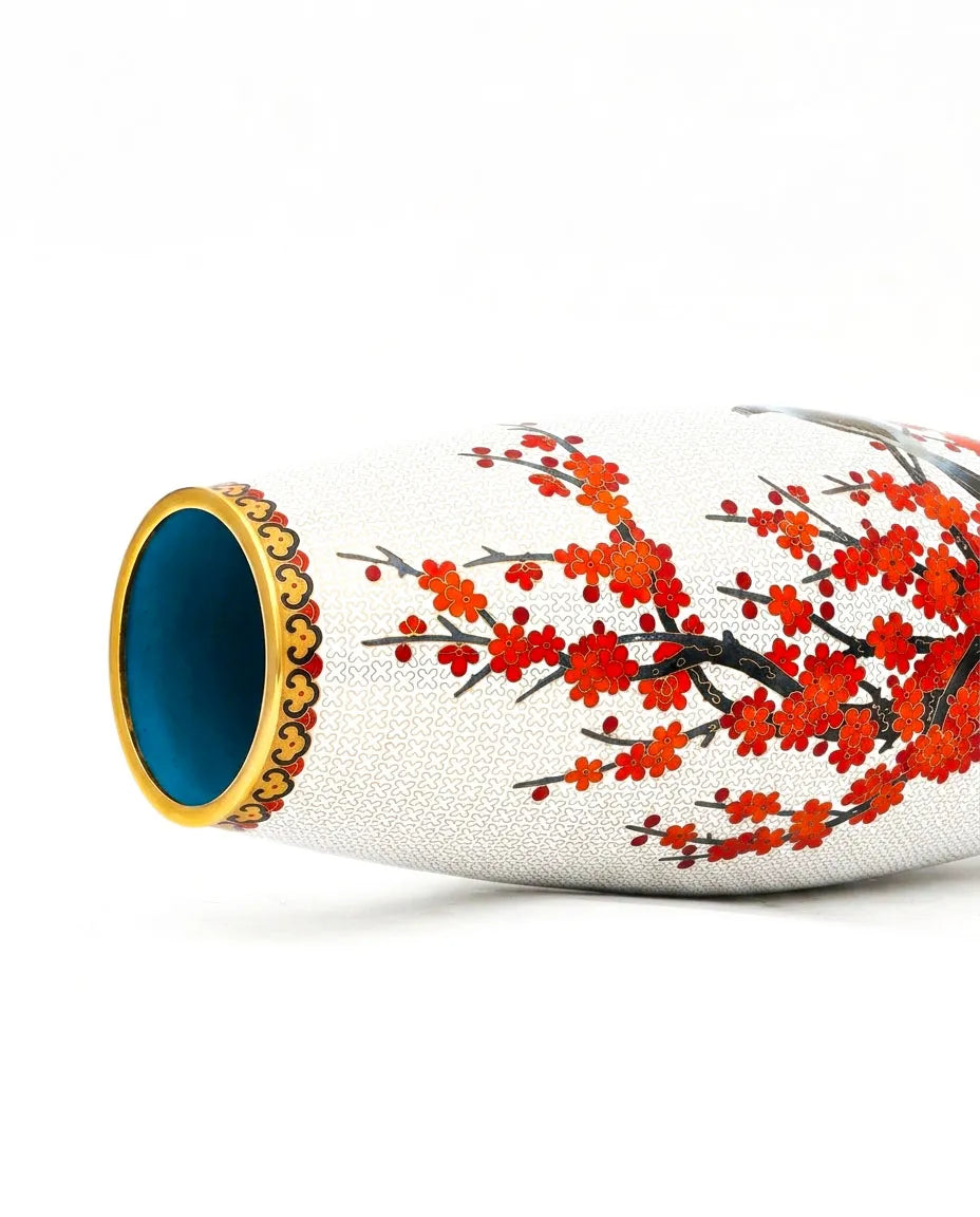 Close-up detail of the gold-plated copper rim and enamel plum blossom pattern on this Royal Cloisonne vase,a premium piece for luxury home decor and home gifts