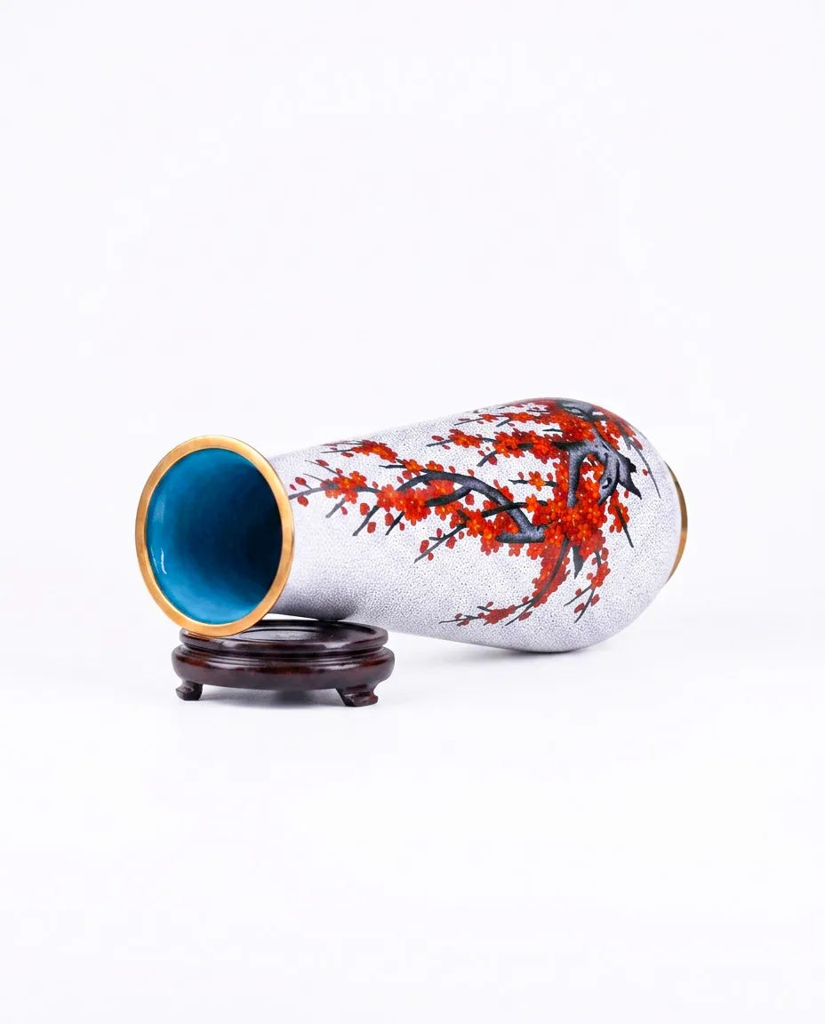 Close-up detail of the gold-plated copper rim and enamel red plum pillar pattern on this Royal Cloisonne vase,a premium piece for luxury home decor and home gifts